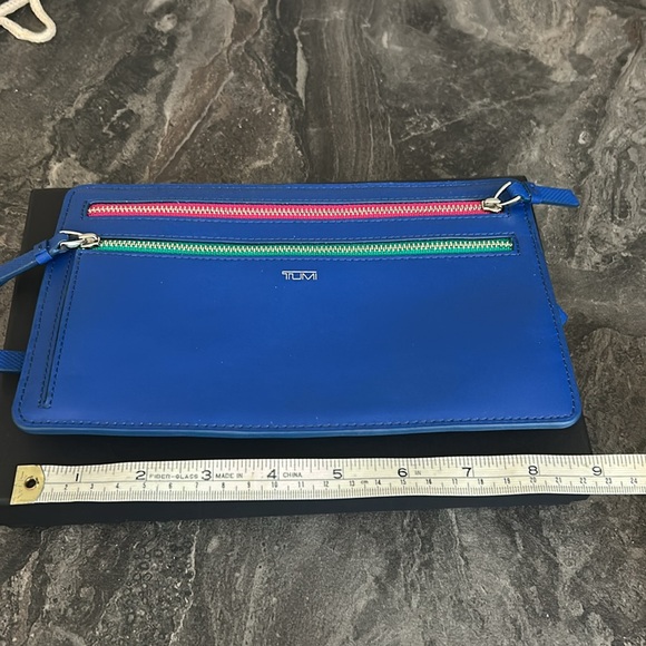Tumi Clutch with 4 zipper/compartments. - Picture 3 of 3